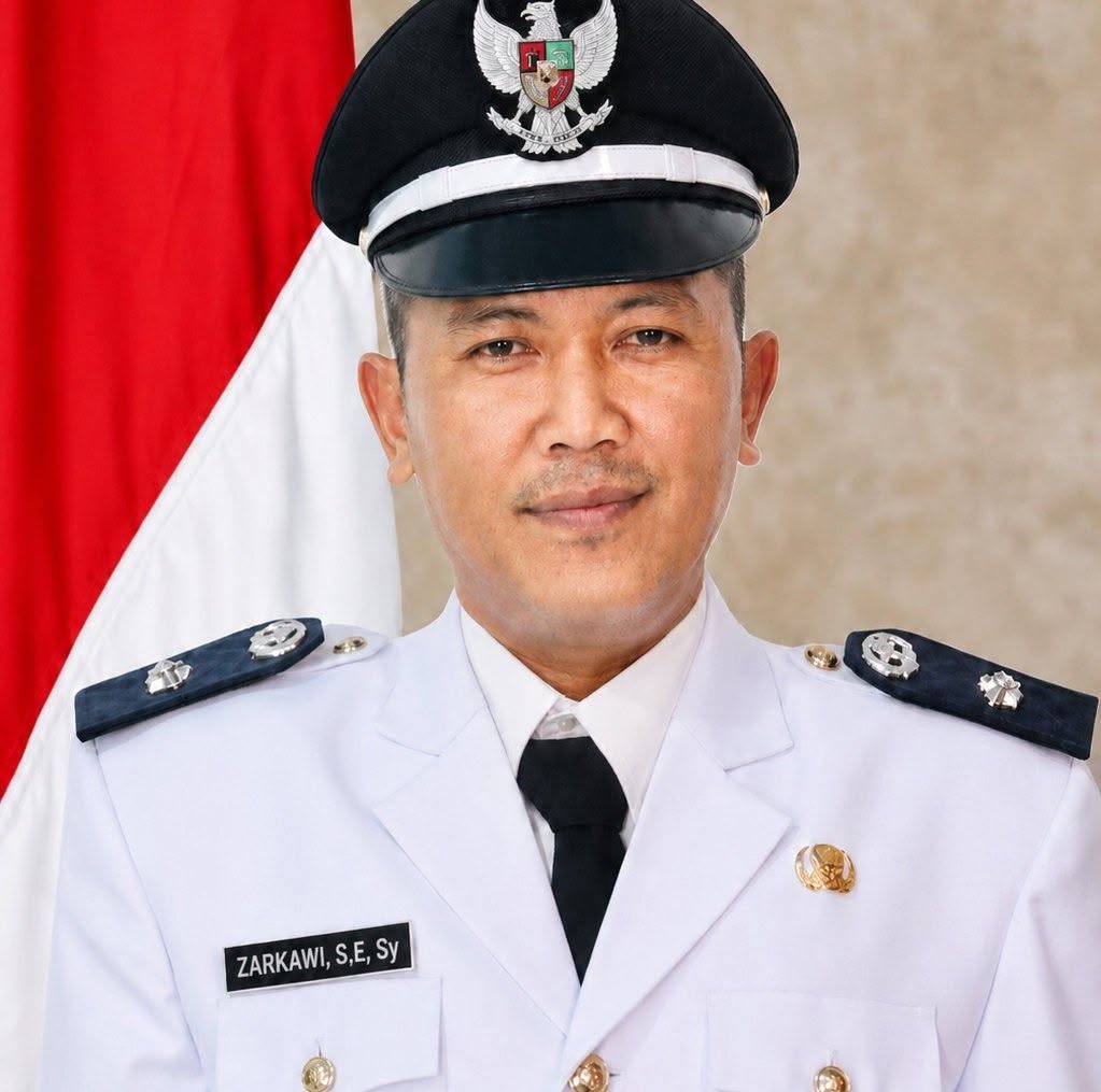 Zarkawi, S.E.Sy, Kepala Desa Limau Manis